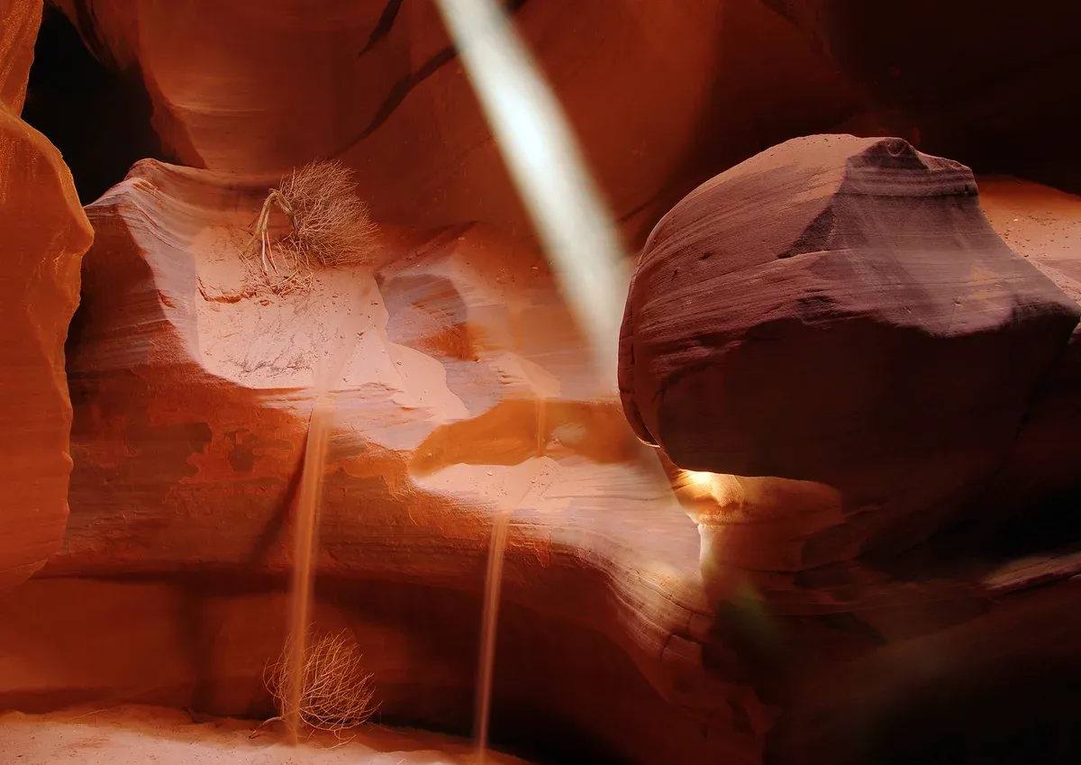 Light beam shining into Upper Antelope Canyon, a stop on an Antelope Canyon tour from Las Vegas, Page, Arizona.